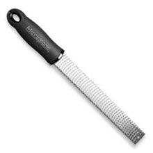 Load image into Gallery viewer, Microplane 40020 Zester Grater Made in USA Stainless Steel Blade for Zesting Citrus and Grating Cheese - Plastic Handle - Black
